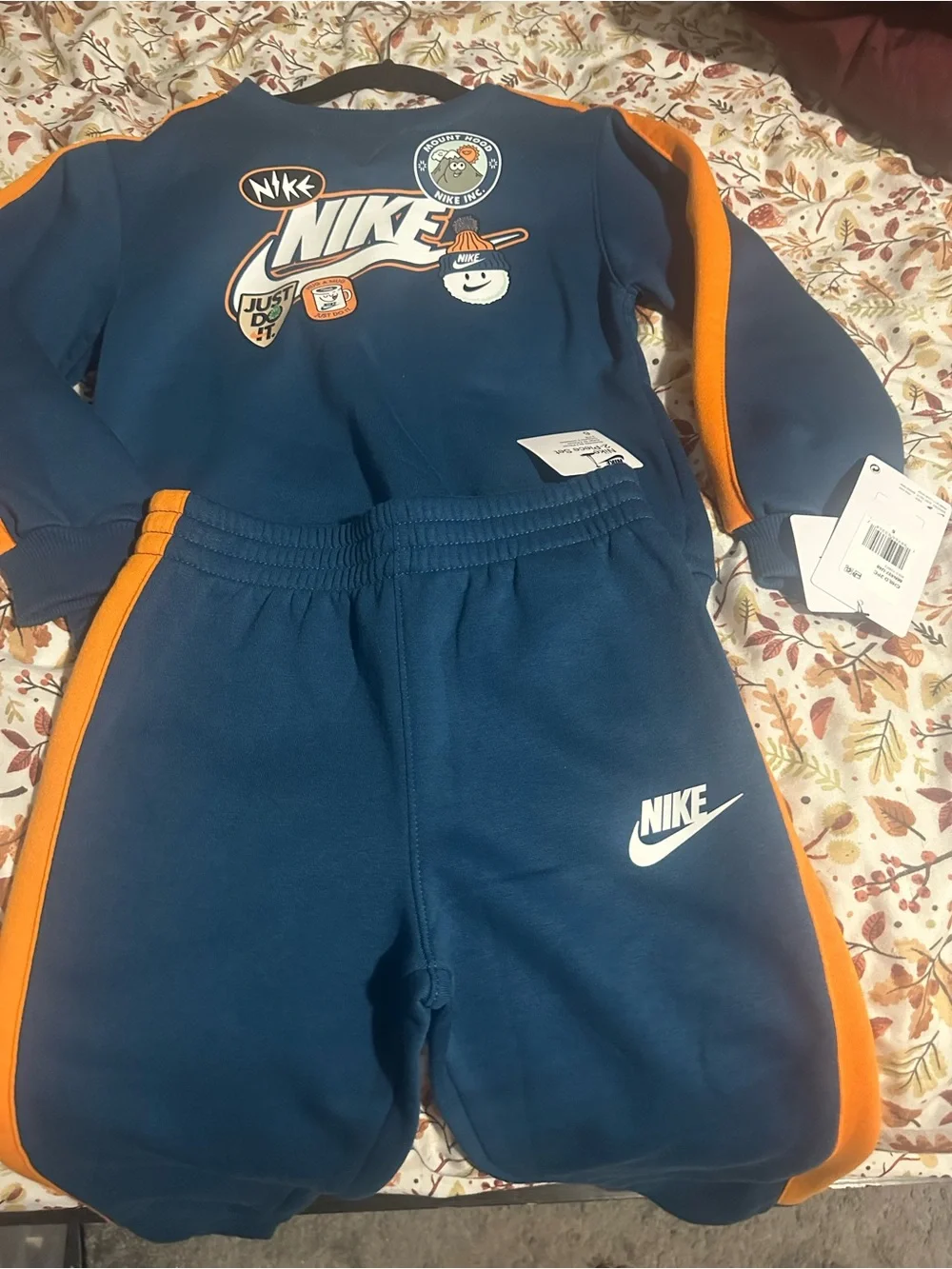 Nike Kids Navy Blue Sweatpants with Orange Stripes
